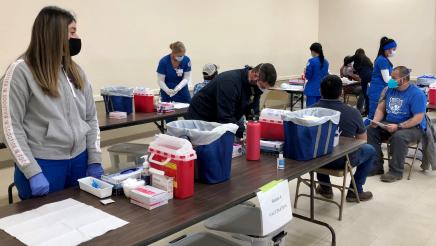 Assemblymember Dr. Joaquin Arambula and Fresno State nursing students vaccinated people seeking COVID-19 shots at a clinic in Biola on Feb. 25, 2021. Other regular clinic partners in 2021 included Saint Agnes Medical Center.