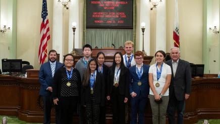Assemblymember Dr. Joaquin Arambula and Assemblymember Jim Patterson welcome members of the champion University High School Academic Decathlon team of Fresno to the Assembly Floor on June 6, 2022. The team won the Small Schools national title at the 2022 U.S. Academic Decathlon, making it the school's 14th national A.D. championship.