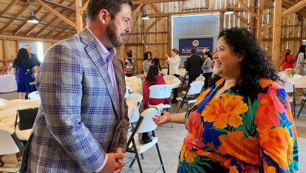 Assemblymember Dr. Joaquin Arambula chats with Dr. Tania Pacheco-Werner at the luncheon.