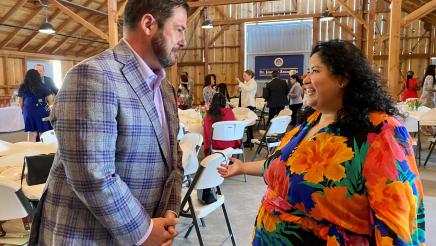Assemblymember Dr. Joaquin Arambula chats with Dr. Tania Pacheco-Werner at the luncheon.