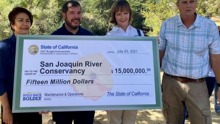 On July 23, 2021, Assemblymember Dr. Joaquin Arambula presented a $15 million check in State funds to the San Joaquin River Conservancy. Seen with him are State Sen. Anna Caballero; Sharon Weaver of the San Joaquin Parkway and Conservation Trust; and John Shelton of the Conservancy.