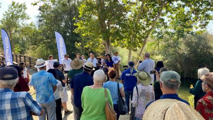 Supporters of the San Joaquin River Parkway gathered for the July 23, 2021 news conference at Wildwood Native Park on the San Joaquin River. The funds, for operations and land maintenance, will help increase public access to the parkway.