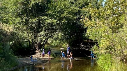People enjoy the San Joaquin River the morning of the July 23, 2021 press conference announcing $15 million in State funds for the San Joaquin River Conservancy to help increase public access to the river.