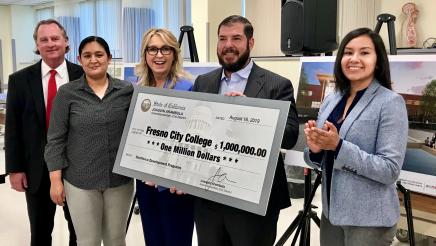 Assemblymember Arambula presents the $1 million check to (from left) State Center Community College District (SCCCD) Trustees Bobby Kahn and Magdalena Gomez, Fresno City College President Dr. Carole Goldsmith, and SCCCD Trustee Annalisa Perea.
