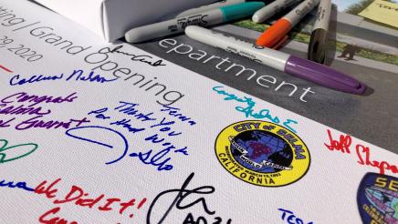 Assemblymember Arambula’s signature is among those on an event sign for the Selma Police Department ribbon cutting.