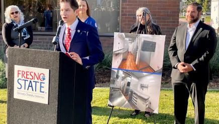 Dr. Saúl Jiménez-Sandoval, President of Fresno State, speaks at a press conference on October 4, 2022 announcing a $4 million State allocation that Assemblymember Dr. Joaquin Arambula (at the right in the photo) secured for the university’s Mobile Health Unit.