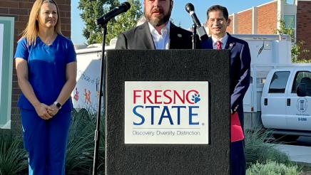 Assemblymember Dr. Joaquin Arambula talks at a press conference about the $4 million State allocation he secured for Fresno State’s Mobile Health Unit that provides free basic health services to rural and disadvantaged communities.