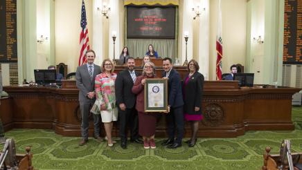 Assemblymember Dr. Joaquin Arambula selected Genoveva “Veva” Islas as the 2023 Woman of the Year for the 31st Assembly District. Seen with them here are (from left) Assembly Minority Leader James Gallagher, Assembly Majority Leader Eloise Gomez Reyes, Assembly Speaker Anthony Rendon, and Assemblymember Cecilia Aguiar-Curry, vice chair of the California Legislative Women’s Caucus.