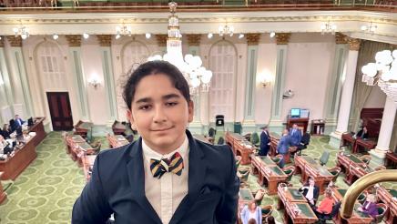 Malachi Suarez, a Central Unified School District student who undertook a successful effort to rename a school in the district, is seen in the gallery of the Assembly chambers at the State Capitol on Aug. 17, 2023.