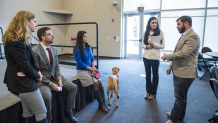 Assemblymember Dr. Arambula visits with attendees of Student Homelessness Press Conference