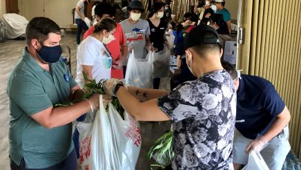 Assemblymember Arambula helped other volunteers at a free food distribution effort at Fresno Interdenominational Refugee Ministries on June 24, 2020.
