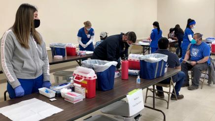 Assemblymember Dr. Joaquin Arambula and Fresno State nursing students vaccinated people seeking COVID-19 shots at a clinic in Biola on Feb. 25, 2021. Other regular clinic partners in 2021 included Saint Agnes Medical Center.