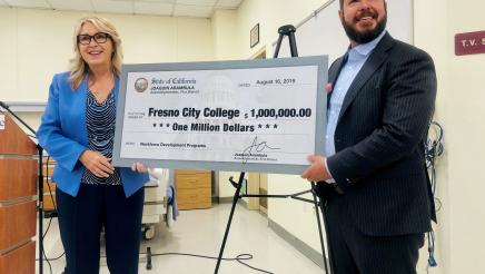 Assemblymember Arambula and Fresno City College President Dr. Carole Goldsmith stand with the $1 million check for the college’s Career and Technical Education program.